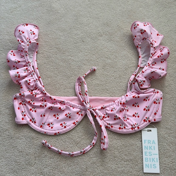 Pastel pink cherry print bikini top with flutter shoulder straps and underwire. - Picture 1 of 4